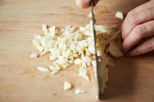 person-mincing-garlic